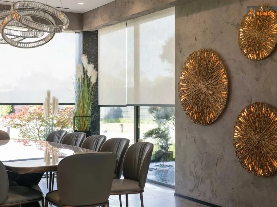 Roller shades softening the daylight in a bright Calgary living space
