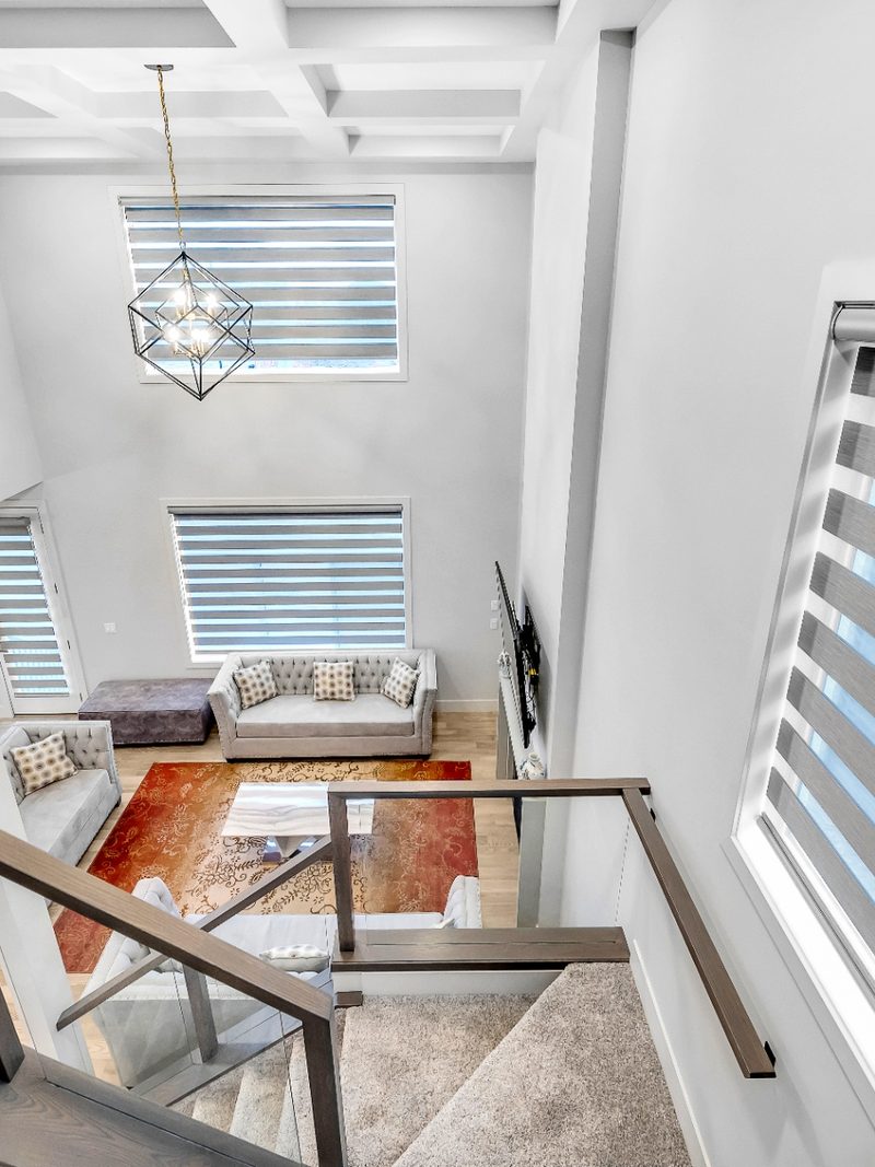 Inglewood stairwell with zebra blinds on tall euro windows
